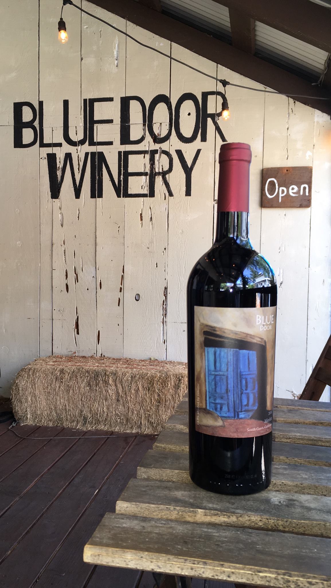 bottle of wine from Blue Door Winery Photo